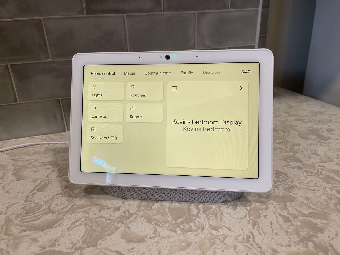 A google nest hub max showing the home control pane to control the smart home