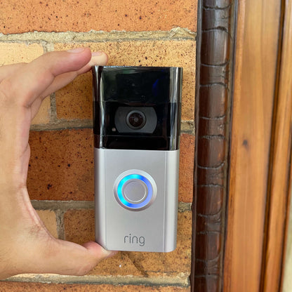 A ring doorbell 3 getting installed at a front porch